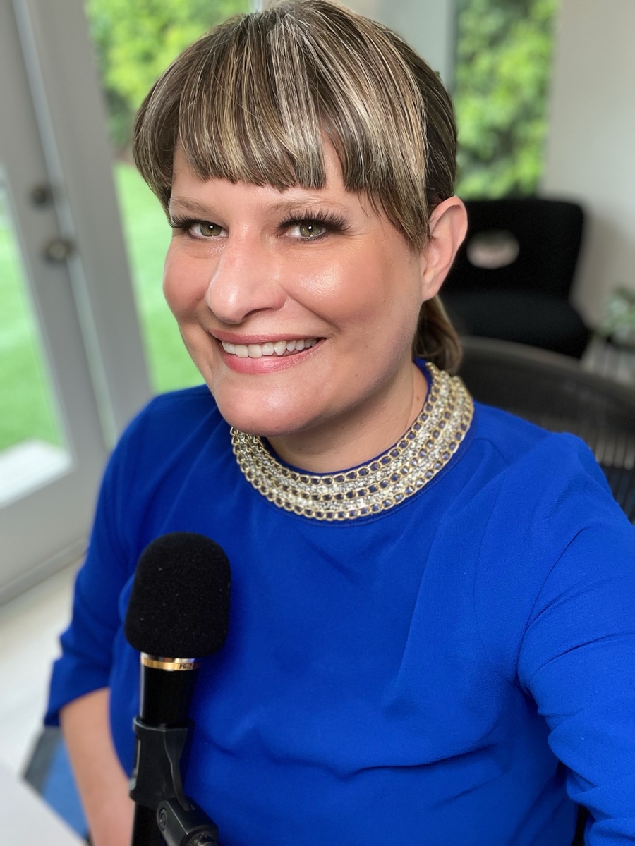 Charissa Nielsen tracking vocals at Studio C on a Heil microphone.